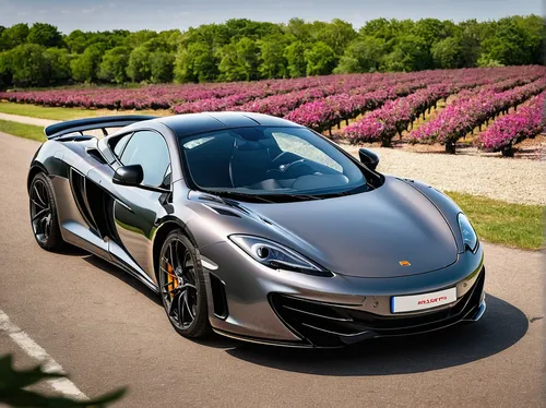 Tell a story about a glamorous couple using a McLaren 12C to arrive at a high-end event.,mclaren mp4-12c,mclaren automotive,mclaren 12c,mp4-12c,mclaren 650s,mclaren,mclaren 570s,mclaren p1,mclarenp1,l