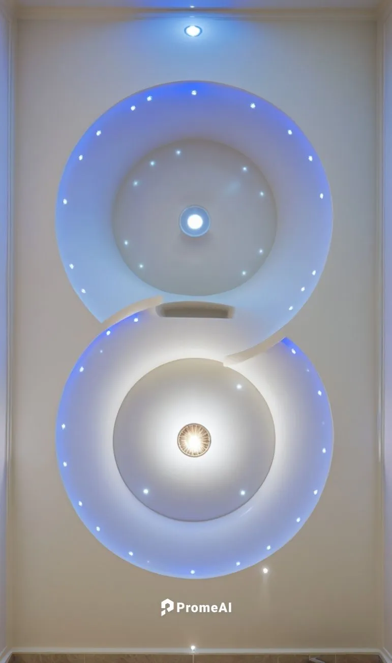 Gypsum decoration in the ceiling of a room with hidden LED lighting
Decor out of the ceiling,turrell,eckankar,acconci,ceiling light,lighting system,rotating beacon,toroidal,ufo interior,revolving ligh