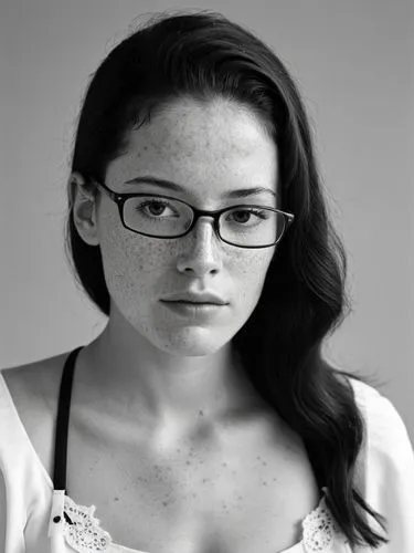 The same scene as a black and white photo. However, the freckles should be visible.,black and white portrait of woman wearing eyeglasses,janeane,with glasses,marymccarty,portrait photographers,denning