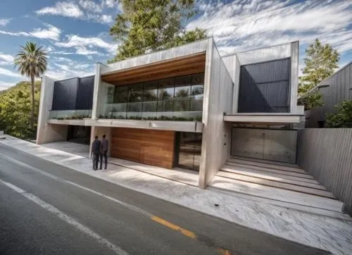 ASFALTO,two men walk by the side of a modern house,dunes house,modern house,cubic house,neutra,cube house,fresnaye,modern architecture,carports,mid century house,cantilevers,carport,residential house,