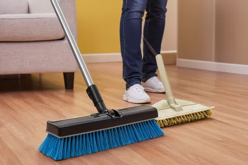 sweeping motion, broom, cleaning action, swift movement, wide arc, clear area, remove debris, tidy up space, maintain cleanliness, floor care, dust removal, smooth gesture, efficient cleaning, thoroug