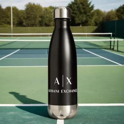 a stainless steel drink bottle standing on the tennis court,oxygen bottle,oxygen cylinder,flask,sports drink,voss,yonex