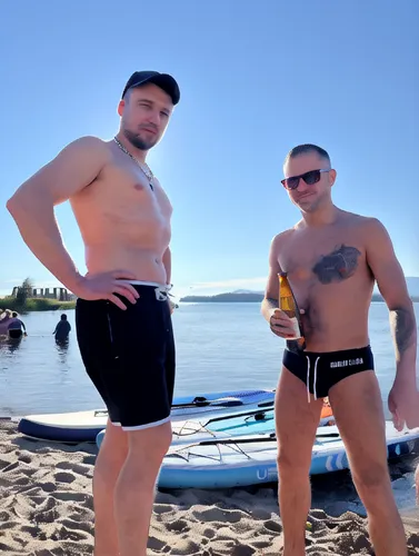 hunks,paddlers,beachgoers,standup paddleboarding,stand-up paddling,icelanders,kayakers,paddle board,bikinians,beach sports,paddleboard,russian holiday,whitefish,paddled,menfolk,bods,beach goers,machos,wetsuits,bellies