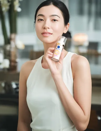 woman holding a smartphone,glucose meter,alipay,wireless tens unit,micro sim,women's cosmetics,oil cosmetic,dermatologist,pocari sweat,natural cosmetic,face cream,mobile phone battery,cosmetic products,huawei,skincare,asian woman,feature phone,perfume bottle,medicine icon,face care