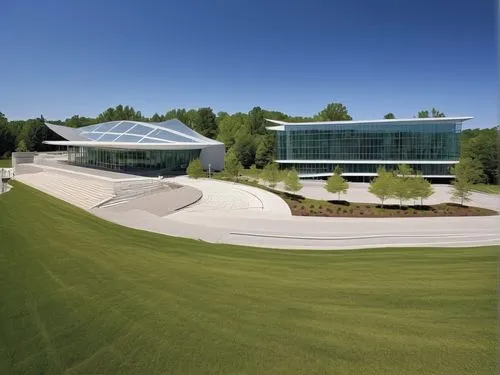 Contemporary museum destination with hotel on a sunny day in Ohio with forest backgound,biotechnology research institute,kettunen center,oval forum,solar cell base,home of apple,new building,school de