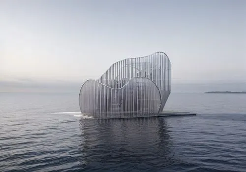 An aluminum pavilion surrounded with nature,floating huts,cube stilt houses,house of the sea,island suspended,aqua studio,floating stage,archidaily,water cube,artificial island,artificial islands,stil