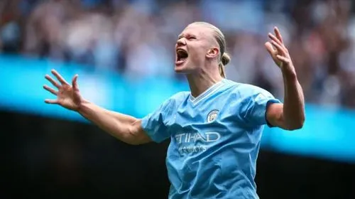 a woman with her arms outstretched while celeting a soccer goal,gudjohnsen,gravesen,kompany,goater,senderos,arjen,rosler,cambiasso,gerwen,klaassen,mooy,naismith,ljungberg,beaglehole,ablett,guidetti,sh