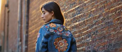 bolero jacket,denim jacket,jean jacket,girl walking away,clover jackets,denim background,patches,jacket,denim fabric,mulan,southwestern,girl in flowers,embroidery,cherokee,half profile,vintage clothing,embroidered,brick wall background,girl from the back,indian girl,Art,Artistic Painting,Artistic Painting 04