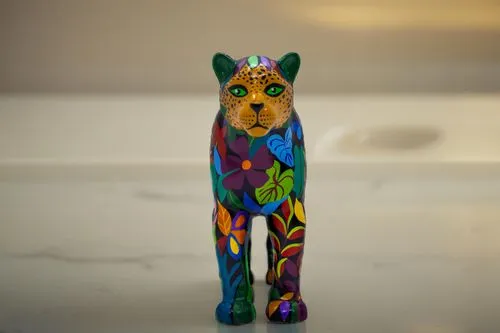 yellow HOUSE,glass yard ornament,glass painting,jaguar,alebrije,fused glass,felidae,sekhmet,polychromed,barkus,panthera leo,figurine,whimsical animals,canidae,panther,felino,decorative figure,doggedly