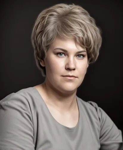 a woman in grey shirt with a sad look on her face,gudmundsdottir,drosselmeier,linnen,kolinda,matvienko,ibragimova,Common,Common,Natural