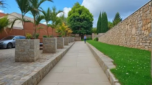 alcazaba,stone wall road,city wall,driveway,landscaped,paving stones,Photography,General,Realistic