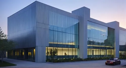 As the camera zooms in on the exterior façade, a man in a crisp orange hat sits at the edge of a rickety glass podium, his eyes locked as the viewer gazes out at the bustling intersection. The exterio