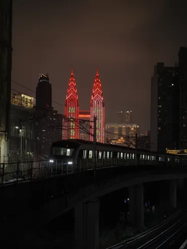 glowing red heart on railway,chicago night,chrysler building,cleveland,union station,red milan,urban towers,south station,hollywood metro station,longexposure,midtown,international towers,chicago,metropolis,tribute in lights,manhattan skyline,elevated railway,jersey city,ambient lights,red tones