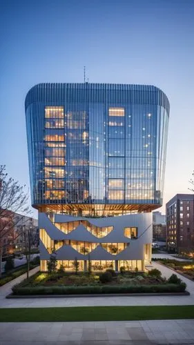 A magnificent building towering above the bustling streets of an urban neighborhood. This architectural marvel features sleek, modern lines and a facade adorned with expansive glass panels that reflec