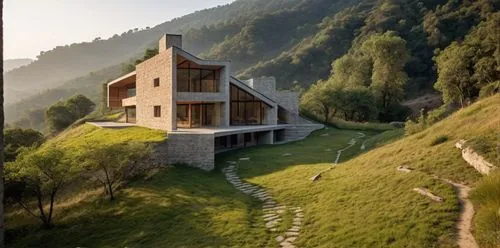 Battle hardened warriors of mid evil ages in a battlefield ,this house has a modern roof and sloped lawn,house in mountains,house in the mountains,zumthor,swiss house,passivhaus,mountain hut,Photograp