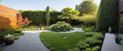 Create a serene garden with lush, well-maintained green grass as the base. Surround the grassy area with vibrant, tropical plants such as bird of paradise, hibiscus, and palms, interspersed with color