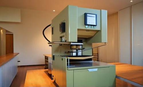 this is a press machine in coffee shop,double head microscope,espresso machine,laboratory oven,laboratory equipment,enlarger,coffeemaker,coffee machine,chiffonier,coffee maker,scientific instrument,as