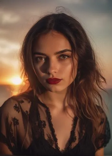 a portrait of a beautiful young caucasian girl brown eyes, black hair, red lips wearing a black dress stand up at sunset in a balcony whit the sea as background in 4k,portrait background,portrait phot