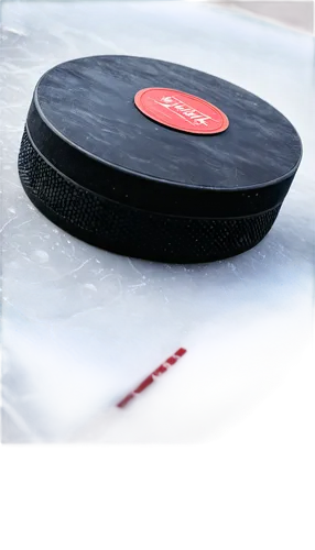 Hockey puck, ice rink, sports equipment, black rubber, red print logo, detailed texture, frozen mist effect, low-angle shot, dramatic lighting, shallow depth of field, cold color tone, 3/4 composition