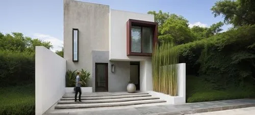 PISO DE CONCRETO,the front of a modern house with an entrance,modern house,cubic house,inverted cottage,residential house,modern architecture,dunes house