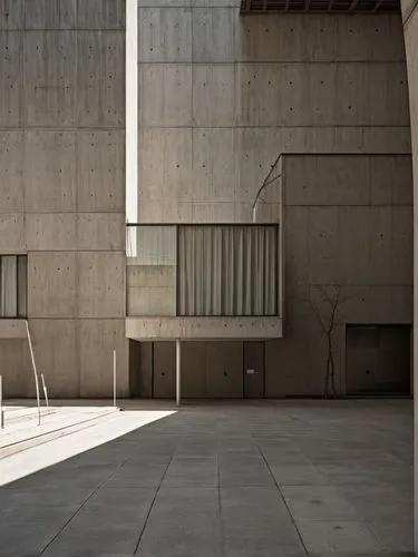 vivienda minimalista con el uso de concreto y madera, con un estilo arquitectonico mies van der rohe,a concrete building with two benches and a door,chipperfield,breuer,salk,siza,mies,brutalist,Photog