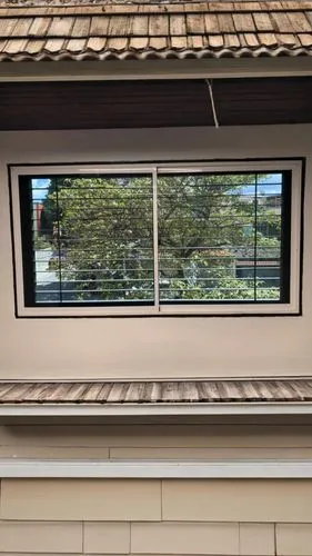 a window is opened to reveal the view outside,transparent window,wooden windows,windowblinds,window blinds,bedroom window,window with shutters,wood window,dormer window,window with grille,window frame