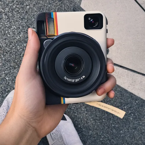 Can you tell me the release date of Instagram?,instant camera,mobile camera,photo camera,lens cap,instagram logo,lens hood,mirrorless interchangeable-lens camera,photo lens,photo-camera,full frame cam