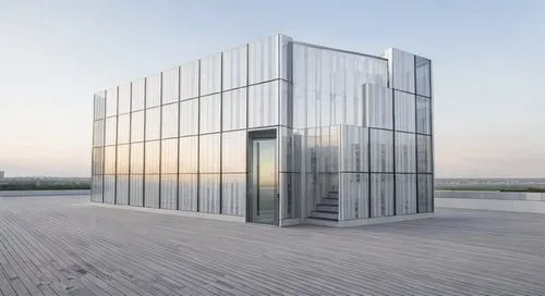 2-level glass-fronted building with white interior walls,glass facade,cubic house,mirror house,cube house,glass building,structural glass,metal cladding,cube stilt houses,frame house,lattice windows,a