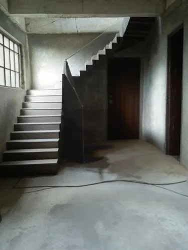 Room door,a long staircase leading up to a second story,outside staircase,downstairs,strachwitz,upstairs,winding staircase,circular staircase