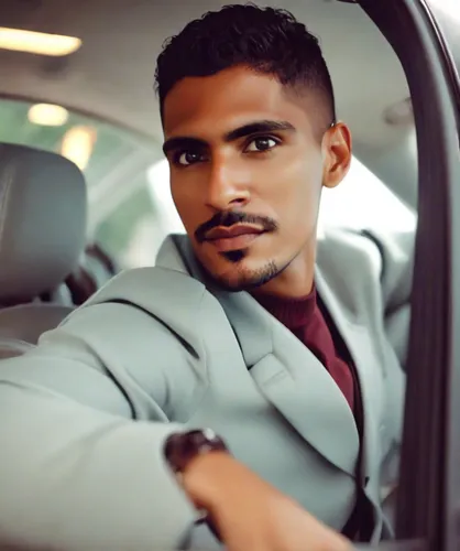 Man driving a car,black businessman,cab driver,pakistani boy,in car,social,abdel rahman,male model,chauffeur car,portrait photography,businessman,auto financing,african businessman,car model,film acto