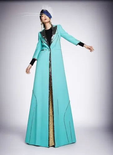 a woman in a long blue dress with a headpiece,abayas,tahiliani,kurung,abaya,uzbek,mevlana,Photography,Fashion Photography,Fashion Photography 14