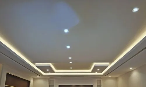 Gypsum decoration in the ceiling of a room with hidden LED lighting,a room is dimly lit by modern lighting,stucco ceiling,ceiling lighting,ceiling light,plafond,ceiling construction,concrete ceiling,P