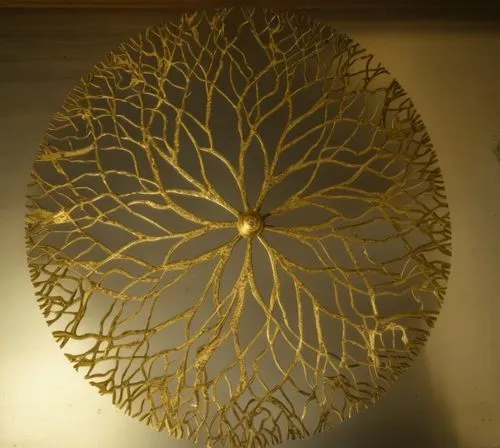 rough antique brass table top,a gold leaf - like sculpture is displayed in a circular frame,gold foil tree of life,wall light,wall lamp,circular ornament,ceiling light,ensconce,Photography,General,Rea