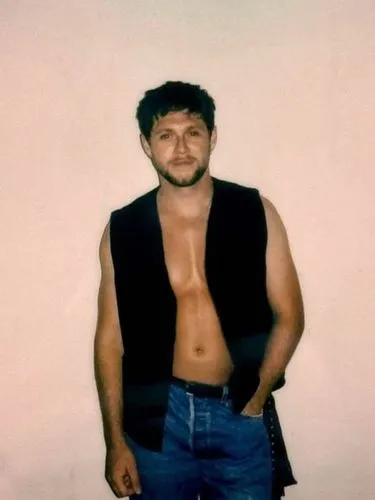 naked man,a man in jeans and a vest standing by a wall,chippendales,malenko,nial,pectorals,photo session in torn clothes,niall