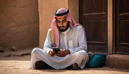 emirati,man talking on the phone,saudi,najjab,supplicating,man praying,Photography,Documentary Photography,Documentary Photography 22