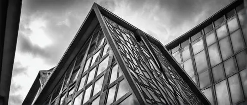 Modern building, CompTIA architecture, sleek lines, steel beams, glass façade, minimalist design, urban cityscape, cloudy sky, dramatic lighting, 3/4 composition, shallow depth of field, abstract back