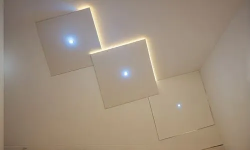 Gypsum decoration in the ceiling of a room with hidden LED lighting,four mirrors on the ceiling reflecting lights in a bathroom,ceiling light,wall lamp,velux,ceiling lighting,wall light,ceiling lamp,P