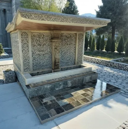 in the forest, antique fountain, blasting stone, marble coating, marble motif, decorative marble elements, shaped marble pieces,,this is a decorative water fountain in the park,epitaphios,tomb,mausole