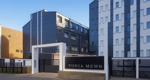 COLRS SHOULD BE GREY AND WHITE, GATE BLACK, SIGN ON BUILDING TONIA MEWS, NO DISTORTION OF IMAGE, ,loyola,yoma,nycha,reclad,tooma,tvu,tonelson,luoma,sva,metal cladding,myoma,telenews,residential tower,