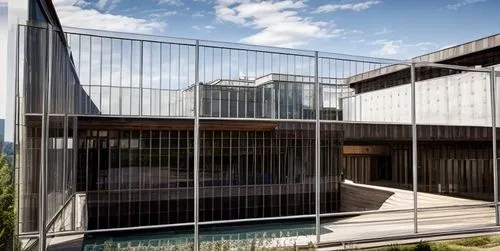 metal cladding,moveable bridge,glass facade,archidaily,cubic house,structural glass,mirror house,metal railing,modern architecture,frame house,dunes house,timber house,house hevelius,chilehaus,steel construction,residential house,aqua studio,arq,contemporary,wire mesh fence,Architecture,General,Modern,Elemental Architecture