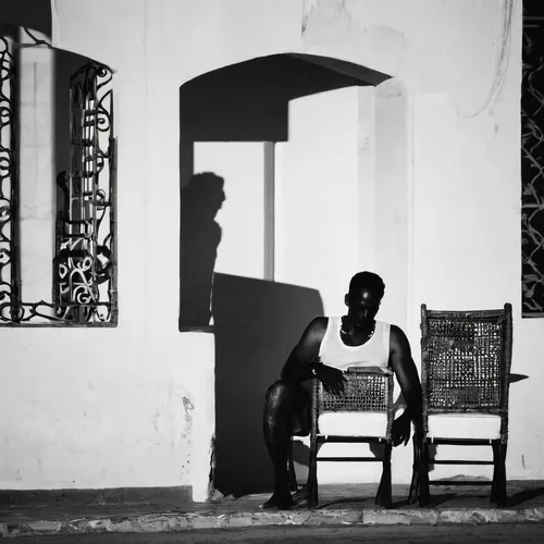 cuba_man_in_chair_2.jpg,mannequin silhouettes,man silhouette,shadow play,man on a bench,blackandwhitephotography,senegal,sillouette,silhouette of man,havana,woman silhouette,benin,in a shadow,haiti,ma