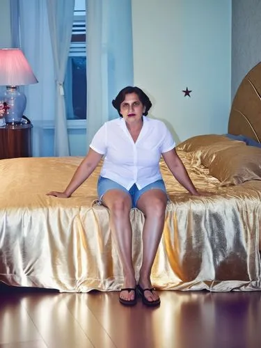 the woman sits on the bed and smiles,neistat,mattress,hotel man,hila,devito,watsky,Photography,General,Realistic