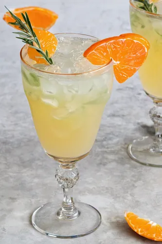 Describe a refreshing mandarin orange cocktail recipe.,orange bitters,melon cocktail,passion fruit daiquiri,harvey wallbanger,pineapple cocktail,classic cocktail,valencia orange,shrimp cocktail,juicy 