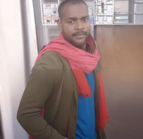  ,an african american man standing in front of a refrigerator,abdi,abdikarim,ameer,abdirizak,abdiaziz,tariq