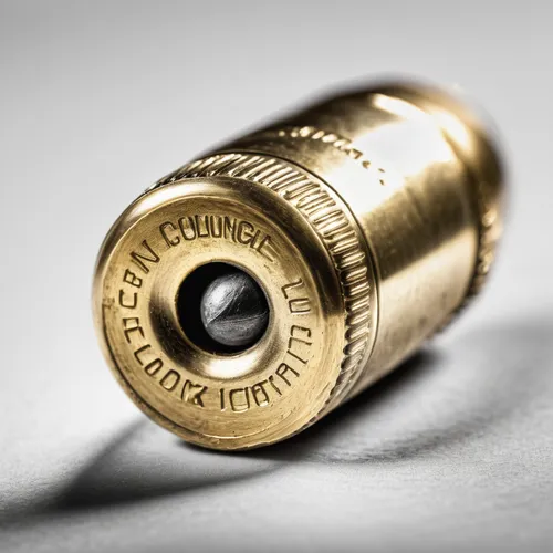 .50 caliber bullet, close-up, shiny brass, engraved details, rifling marks, isolated on white, high contrast lighting, macro lens, detailed texture, metallic surface, realistic, depth of field, still 