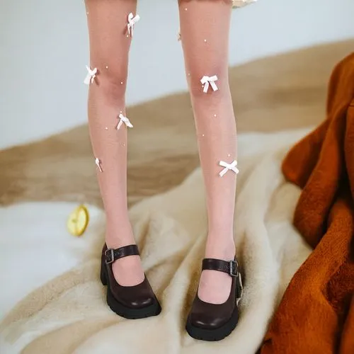 small doll legs with white bows on them,witches legs,anklets,witch's legs,women's legs,clothespins,legwear