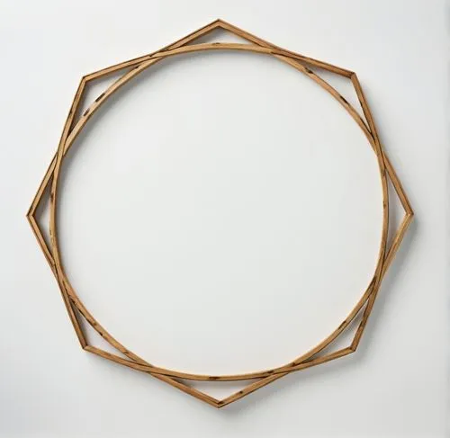 A frame made of wood against a white background,a circular of three wooden sticks on top of white surface,circle shape frame,heart shape frame,openwork frame,oval frame,bamboo frame,copper frame,Conce