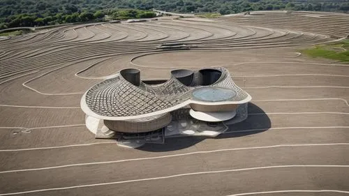 amphitheatre,amphitheater,open air theatre,ancient theatre,cooling tower,soumaya museum,saltworks,sculpture park,aerial landscape,archidaily,earthworks,longues-sur-mer battery,winding steps,buzludzha,