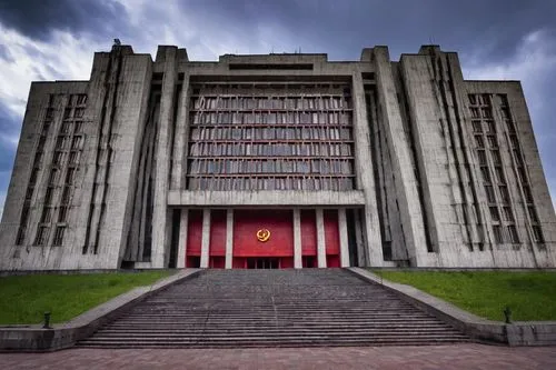 Eastern Bloc architecture, communist-era building, brutalist style, concrete structure, geometric shapes, angular lines, imposing façade, grandiose entrance, Soviet-inspired design, Moscow-style skysc