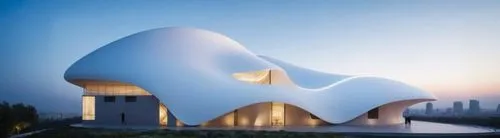 Design a modern building featuring a distinctive round-shaped white shell roof, reminiscent of the Heydar Aliyev Center by Zaha Hadid. The building should exhibit fluid, curvaceous forms and seamless 